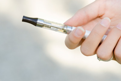 Holding a starter v2 e-cigarette starter kit